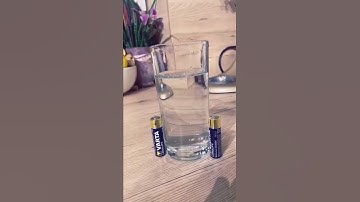 Thumbnail of Experiment with two batteries and a glass of water #shorts