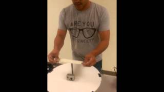 Demonstration of the Coriolis effect in two dimensions with water drops