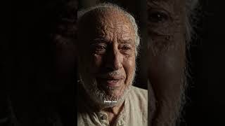 Elderly Middle Eastern man, 75-80 years old, weathered and warm voice