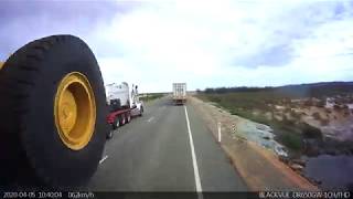 Overtaking a 8 metre (26 ft) wide load with a 53.5 metre (175 ft) roadtrain.