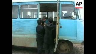 First batch of Chechen refugees hesitantly return back home from tent camps in Ingushetia