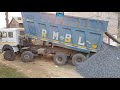 Rmbl truck  tata 3118 tk tipper unloads chips in a congested area  indian heavy vehicles