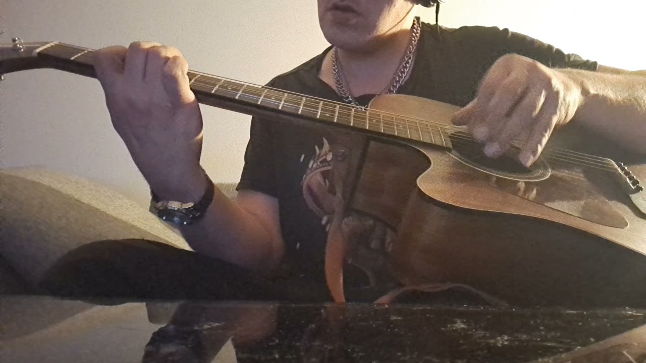 Jimi Hendrix on acoustic guitar