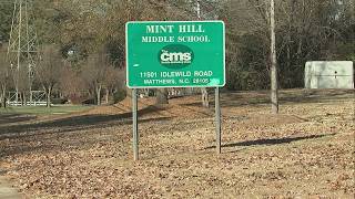 Woman brandishes gun after fight at Mint Hill Middle School drop-off line | WSOC-TV