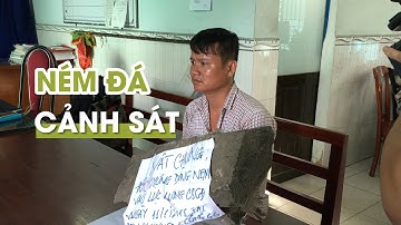 Bắt người ném tảng đá nặng 30 kg vào cảnh sát cơ động