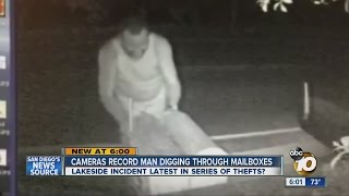 Surveillance camera captures man digging through mailboxes in Lakeside