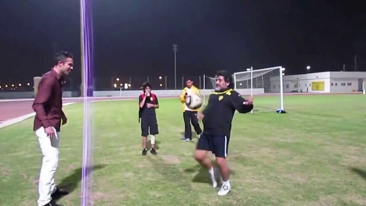 Diego Maradona juggling with van persie