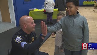 Waterbury police, community youth come together for a holiday gathering