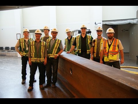 Floating a 10 ton steel beam on air | Traverser une poutre d’acier de 10 tonnes dans le Foyer du CNA