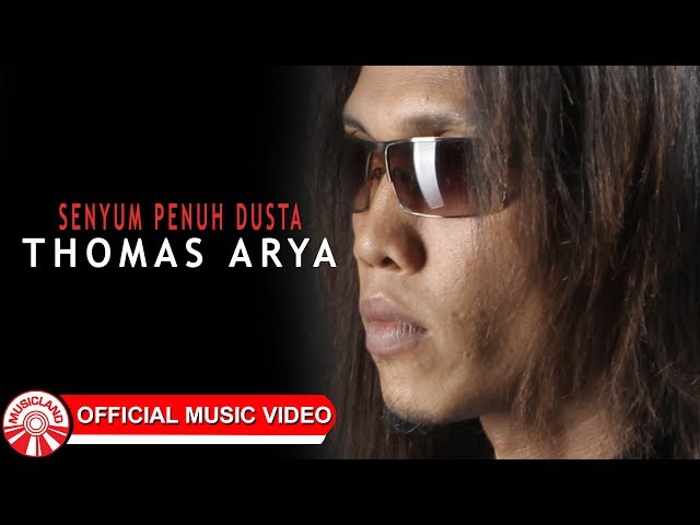 Thomas Arya - Senyum Penuh Dusta [Official Music Video HD] class=