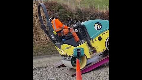 roller compactor small compactor loading in a low bed transporter
