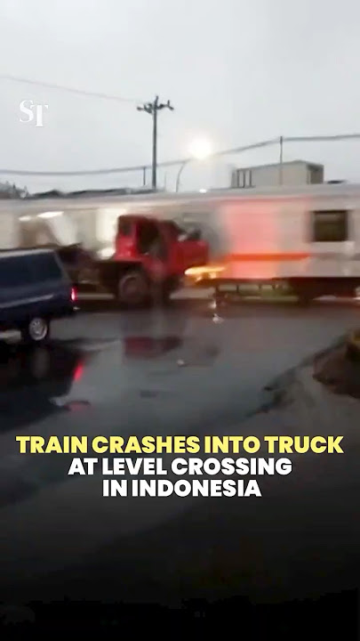 Train crashes into truck at level crossing in Indonesia