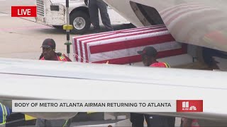 US Airman Roger Fortson's body arrives at Atlanta airport