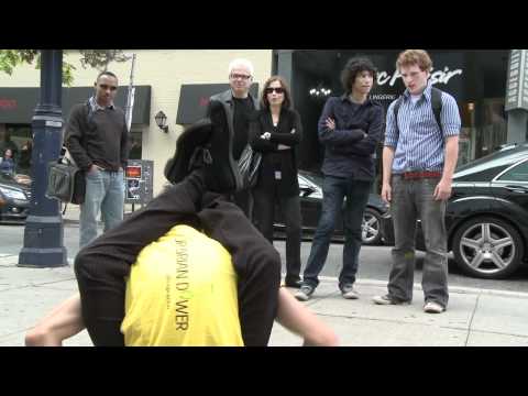 Contortionist act in downtown Toronto for local ch...