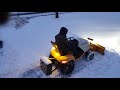 Garden tractor plowing snow Cub cadet 3000 series