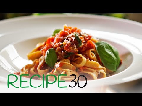 Pasta with fresh tomato, basil and freshly made fettuccine