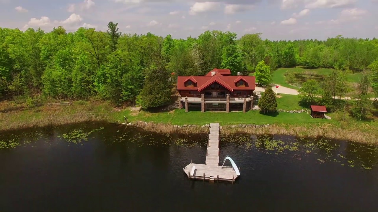 Luxury log home on private lake - YouTube