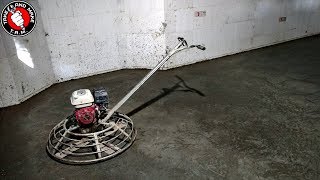 Pouring Basement Floor. Polishing Concrete Floor with Power Trowel