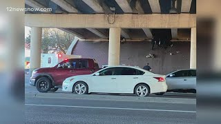 Death investigation ongoing after body found at I-10 underpass on College Street