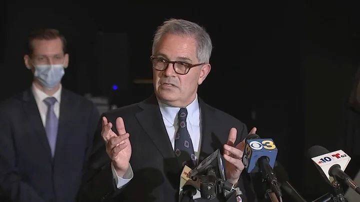 Philadelphia District Attorney Larry Krasner looks...