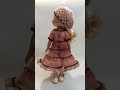 A yarn dress for a doll.