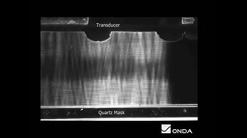 Acoustic Wave Propagation in a Photomask Cleaning System