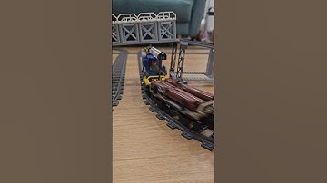 LEGO trains on one track under a bridge! 🚂