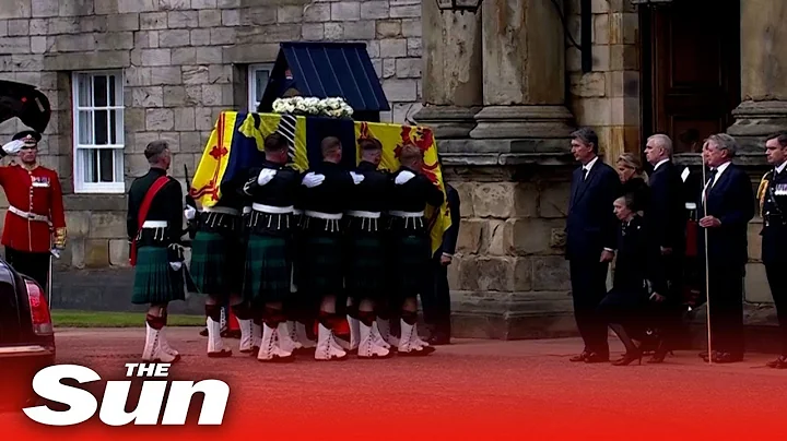 Queens coffin is carried into Holyrood in front of...