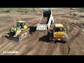 Operator Bulldozer Get Help Dump Truck Stuck In Sand!