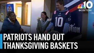 Patriots hand out Thanksgiving food baskets in Roxbury