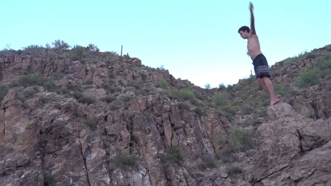 Cliff jumping at Canyon Lake AZ 60 foot front flip 180 YouTube