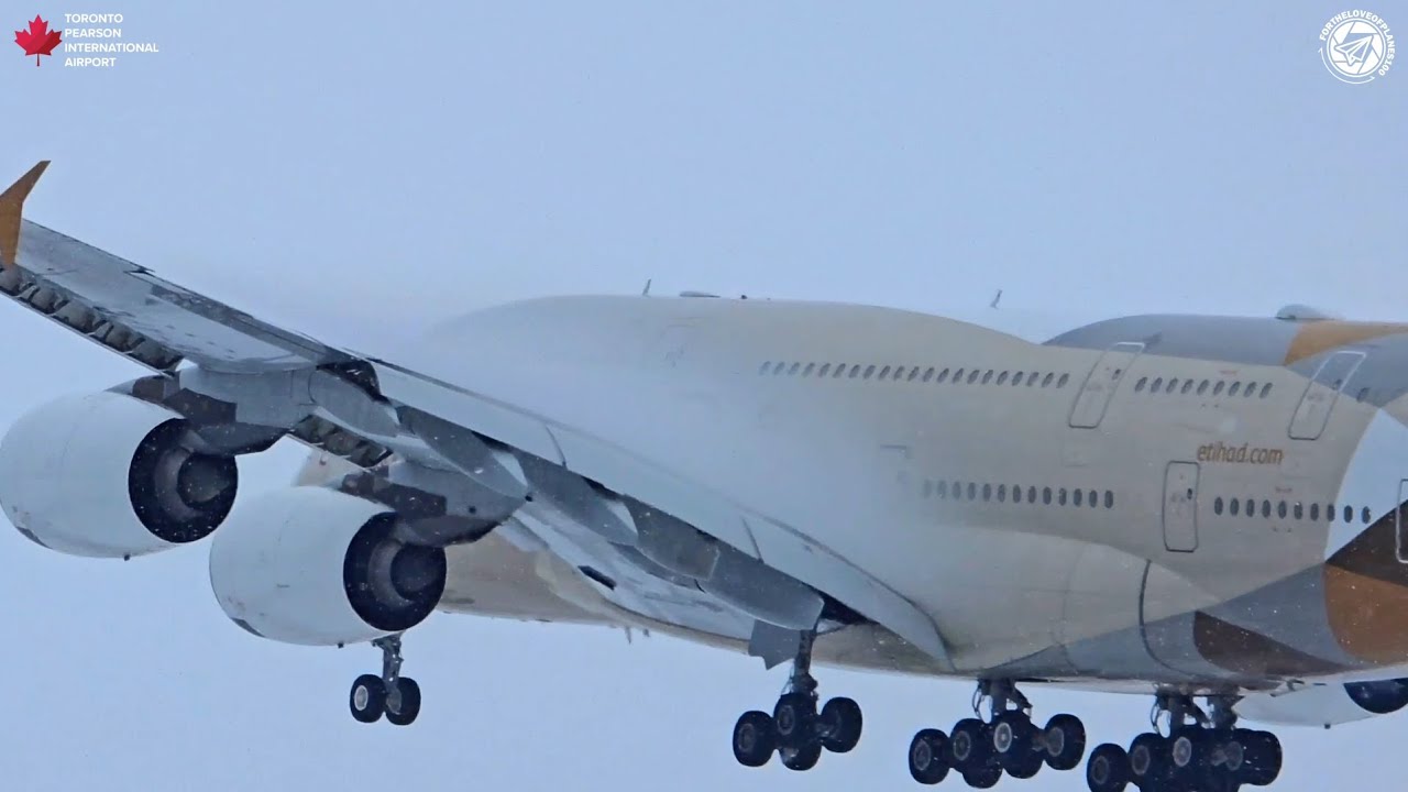 Heavies A380s, 747, 777, A350 stunning landing during snowstorm.