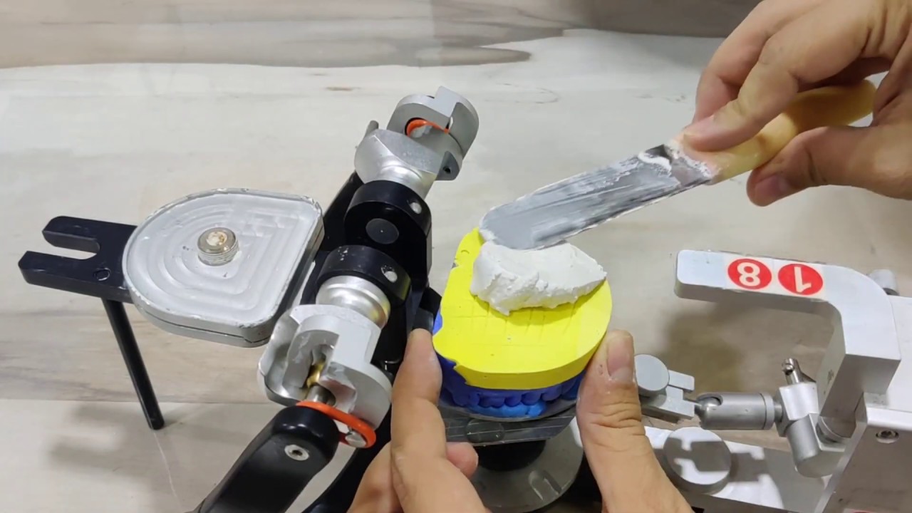 Mounting of casts on a semiadjustable articulator; Corident CSA 400