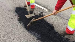 Application Of Permanent Pothole Repair On Busy French Road