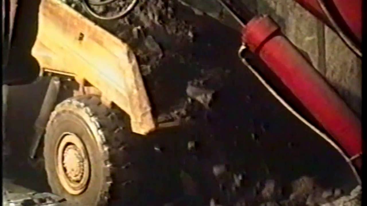 Mining, Underground Haul Dump Truck, Tipping Dirt and Rock Breaker is