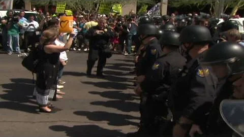 CNN: Police vs. protesters in Arizona