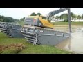 EIK Volvo EC210 Swamp Excavator Unloading from Trailer