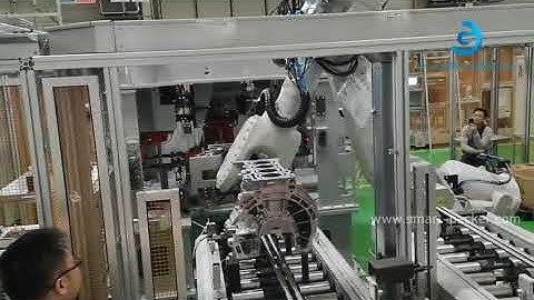 Automobile part assembly machine line with robot hand ABB opertation video