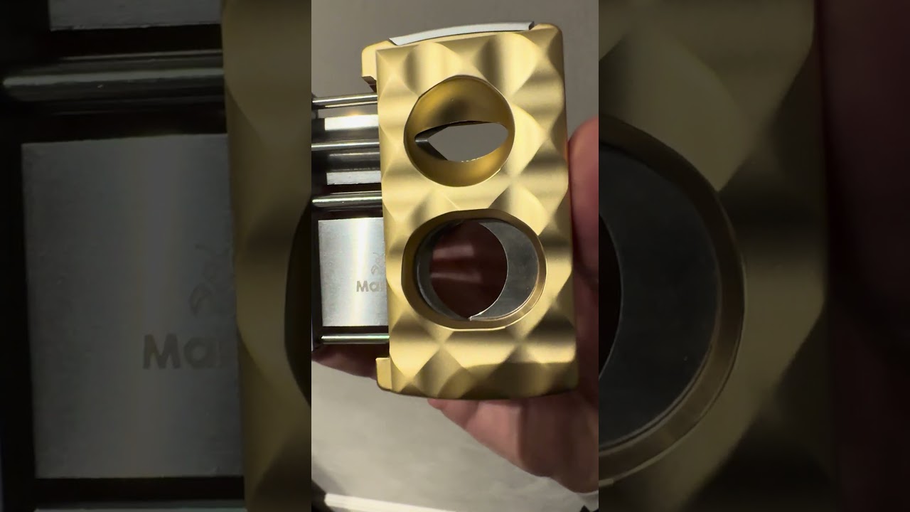 Universal cigar cutter gold.