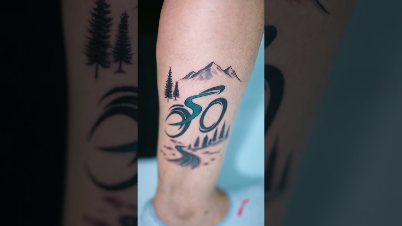 Mountain and cycling tattoo on leg 🚴 | Divinya Inkzone #mountaintattoo #cyclingtattoo #jalandhar