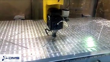 Enclosed DMS 5-Axis CNC Machine Center Cutting an Aluminum Fixture Table with a Fagor CNC Controller