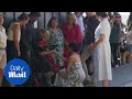 Prince Harry and Meghan Markle meet with locals on Fraser Island