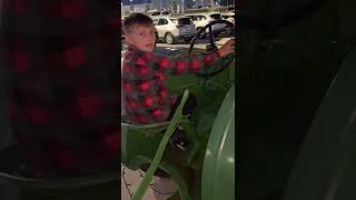Ardmore KAsh driving Tractor at BBQ Swadley's