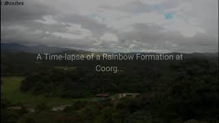 A time-lapse of a rainbow formation over Coorg Valley-