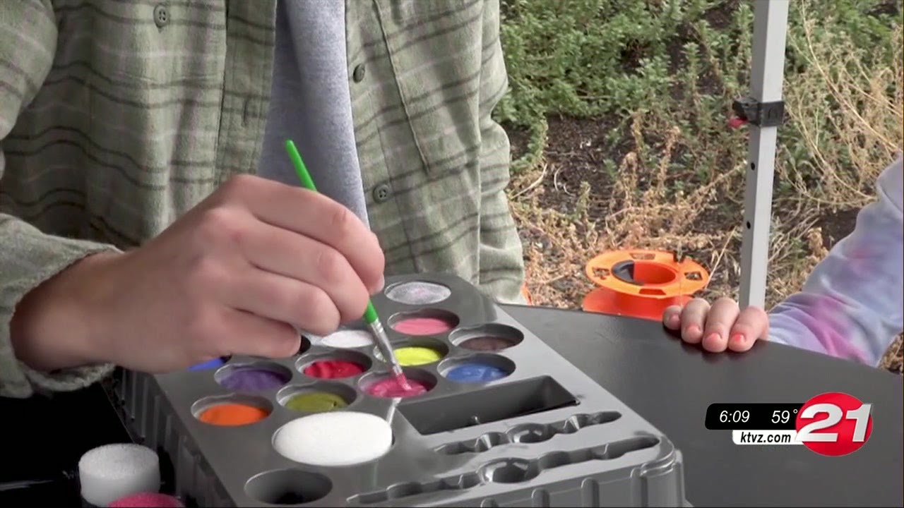 Families enjoy outdoor games for a family fun day at 10 Barrel Brewing East Side Bend