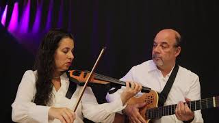 Paulo & Maluh Are Playing The Song Asa From Djavan.