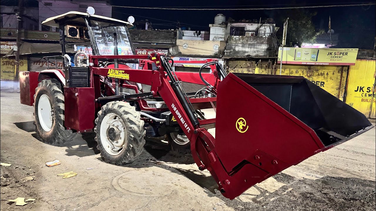 Tractor attachment on Mahindra 605 4x4 loader husk loading height 18FT heavy loader on Arun agro MP