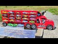 Large trucks discovering many Cars miniature cars while driving