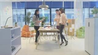 Time-Lapse Businesswomen Working Together in Office