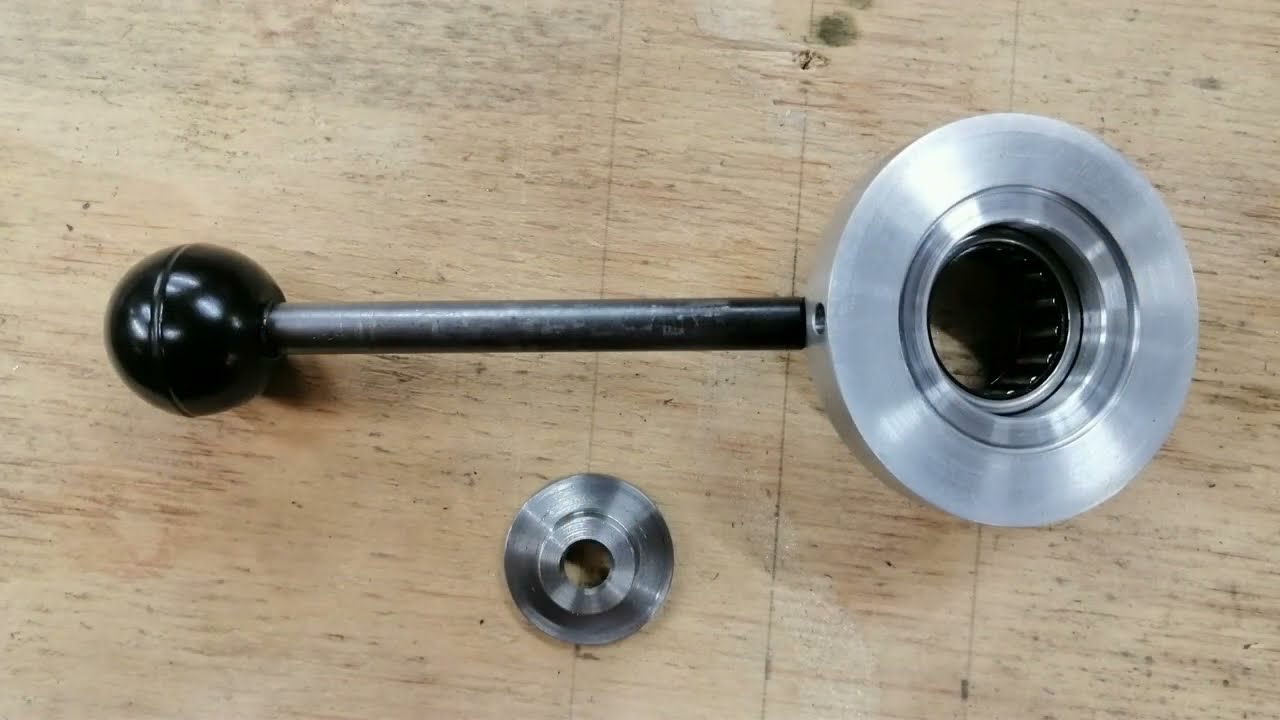 Automatically adjustable Bridgeport quill handle.